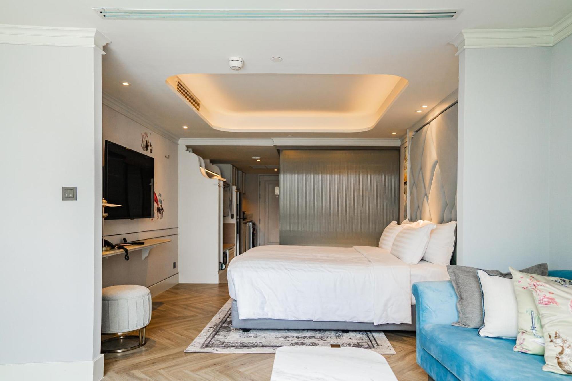 The Salil Hotel Riverside 방콕 외부 사진 A bedroom at the hotel